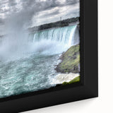 Extra large framed canvas of Niagara Falls in black with vibrant, textured color accents, ideal for living room decor.