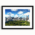 Extra large framed print of a colorful abstract Central Park scene in vibrant hues, ideal for living room decor.