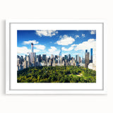 Abstract art print of Central Park with a white frame, featuring muted green and brown tones, ideal for dining room decor.