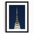 Abstract art print of the Chrysler Building in vibrant colors on a textured, extra large canvas, ideal for living room decor.