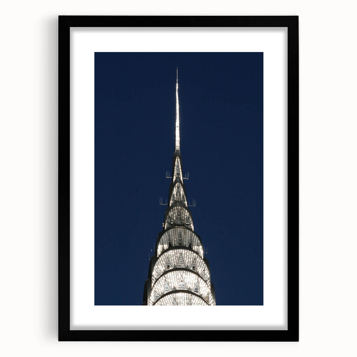 Abstract art print of the Chrysler Building in vibrant colors on a textured, extra large canvas, ideal for living room decor.
