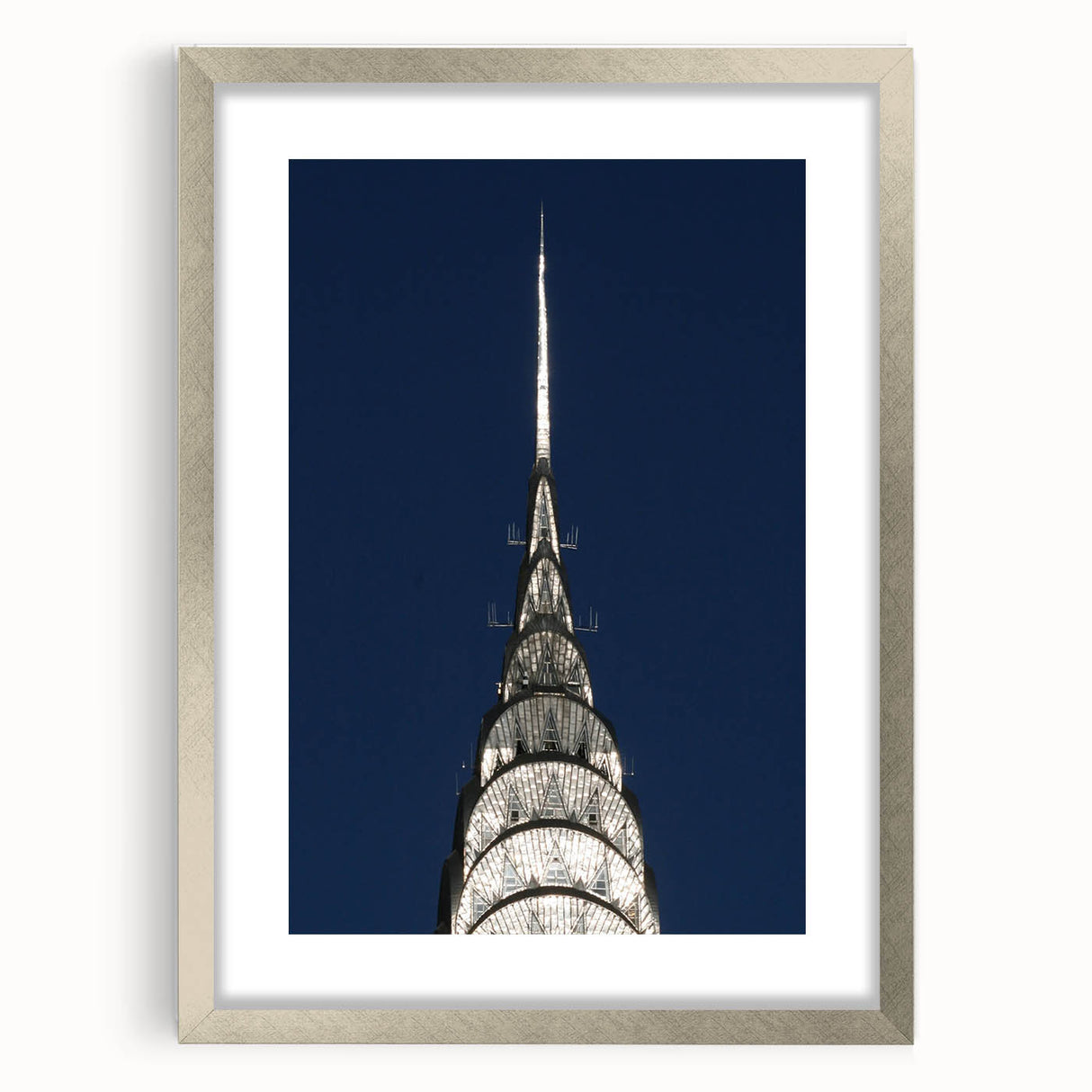 Textured art print of the Chrysler Building in muted gray tones on a framed silver canvas, ideal for bedroom art.