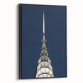 Black and white framed canvas featuring a side view of the Chrysler Building in a vintage poster art style.