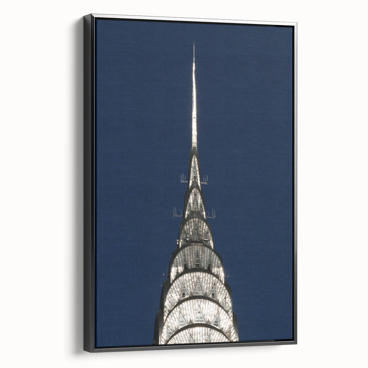 Black and white framed canvas featuring a side view of the Chrysler Building in a vintage poster art style.