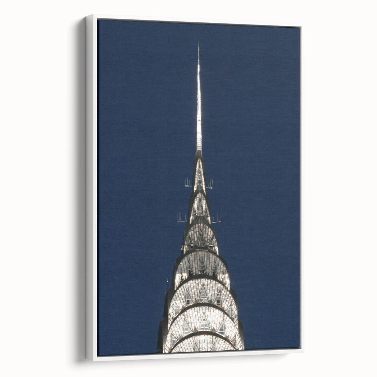 Vintage poster art of the Chrysler Building in muted black and gray tones on a framed canvas, ideal for living room decor.