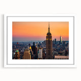 Abstract art print of NYC Empire State building in grayscale, framed with a white mat.
