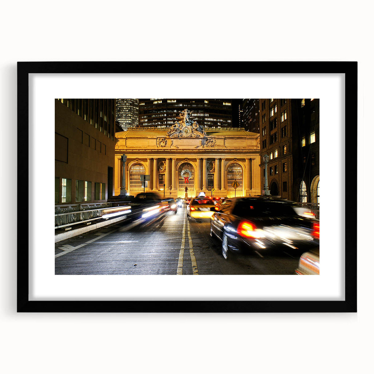 Extra large abstract art print of NYC's Grand Central in vibrant, textured colors on a black framed canvas.