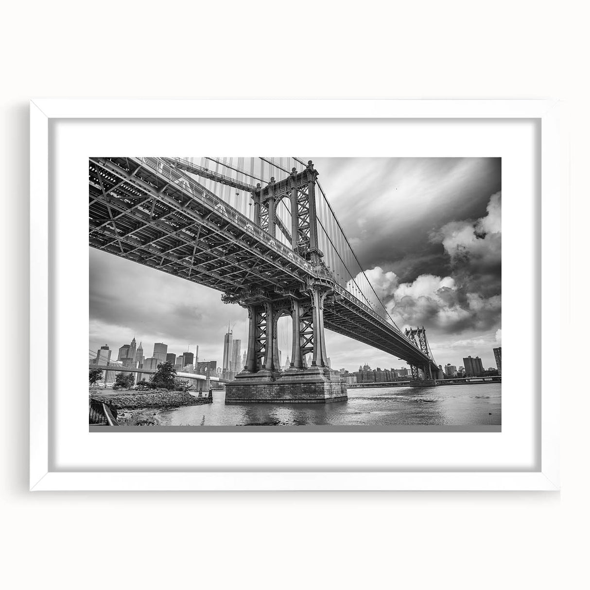 Abstract art print of the Manhattan Bridge in muted gray and blue tones, framed with a white mat.