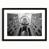 Colorful abstract art print of NYC skyline, in a black frame with mat, suited for living room decor.