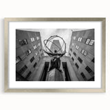 Textured abstract art print of NYC skyline in muted gray, framed in silver, ideal for bedroom art.