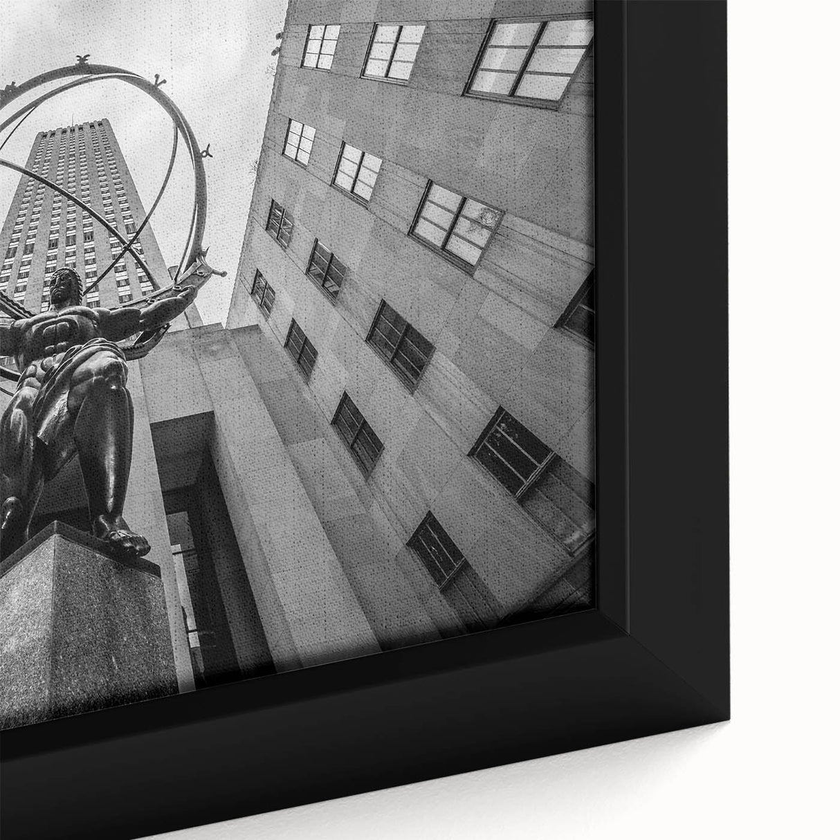 Extra large framed canvas featuring a textured depiction of NYC's Rockefeller Center in black with colorful accents.