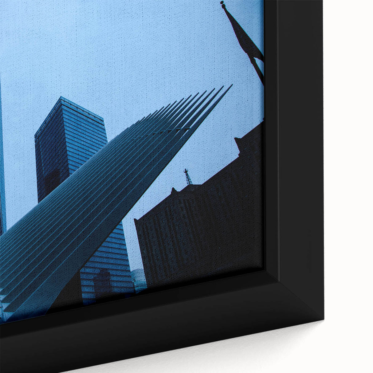 Extra large black wall art featuring a textured New York City skyline with colorful accents on a framed canvas.
