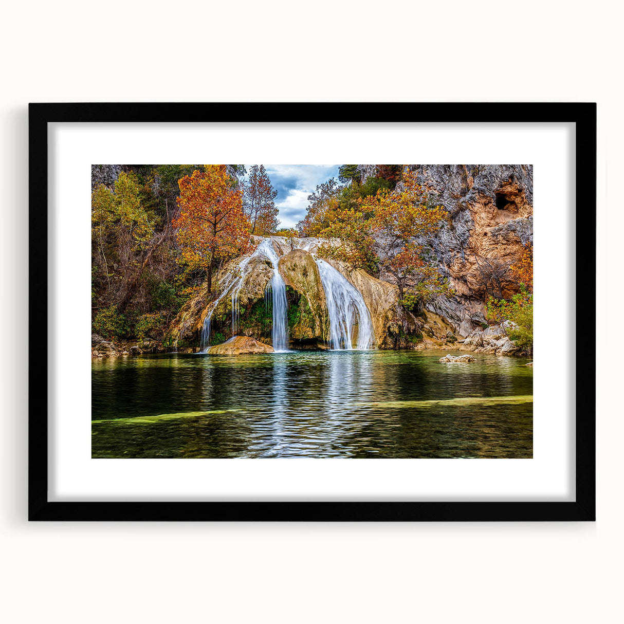 Extra large abstract art print of colorful, textured scenery on a black framed canvas, ideal for living room decor.