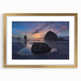 Extra large abstract art print of Cannon Beach, Oregon, in muted gray and blue tones on a framed canvas.