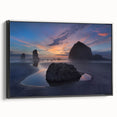 Black and white framed canvas of Cannon Beach, Oregon, with muted tones, ideal for bedroom wall art.