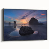 Black and white framed canvas of Cannon Beach, Oregon, with muted tones, ideal for bedroom wall art.