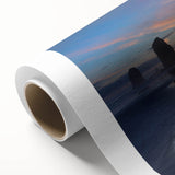 Art deco poster of Cannon Beach, Oregon, with soft pastel shades on rolled canvas, ideal for nursery wall art.