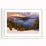 Abstract art print of Crater Lake in muted blue and green tones, framed in white, ideal for dining room decor.