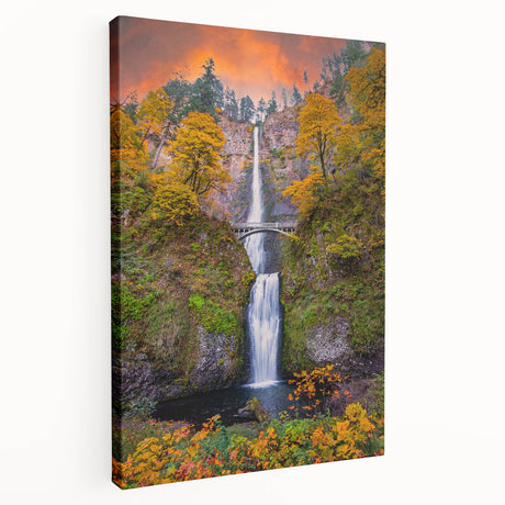 Large art print of Multnomah Falls in Oregon, displayed on stretched canvas, with vibrant green and blue tones.
