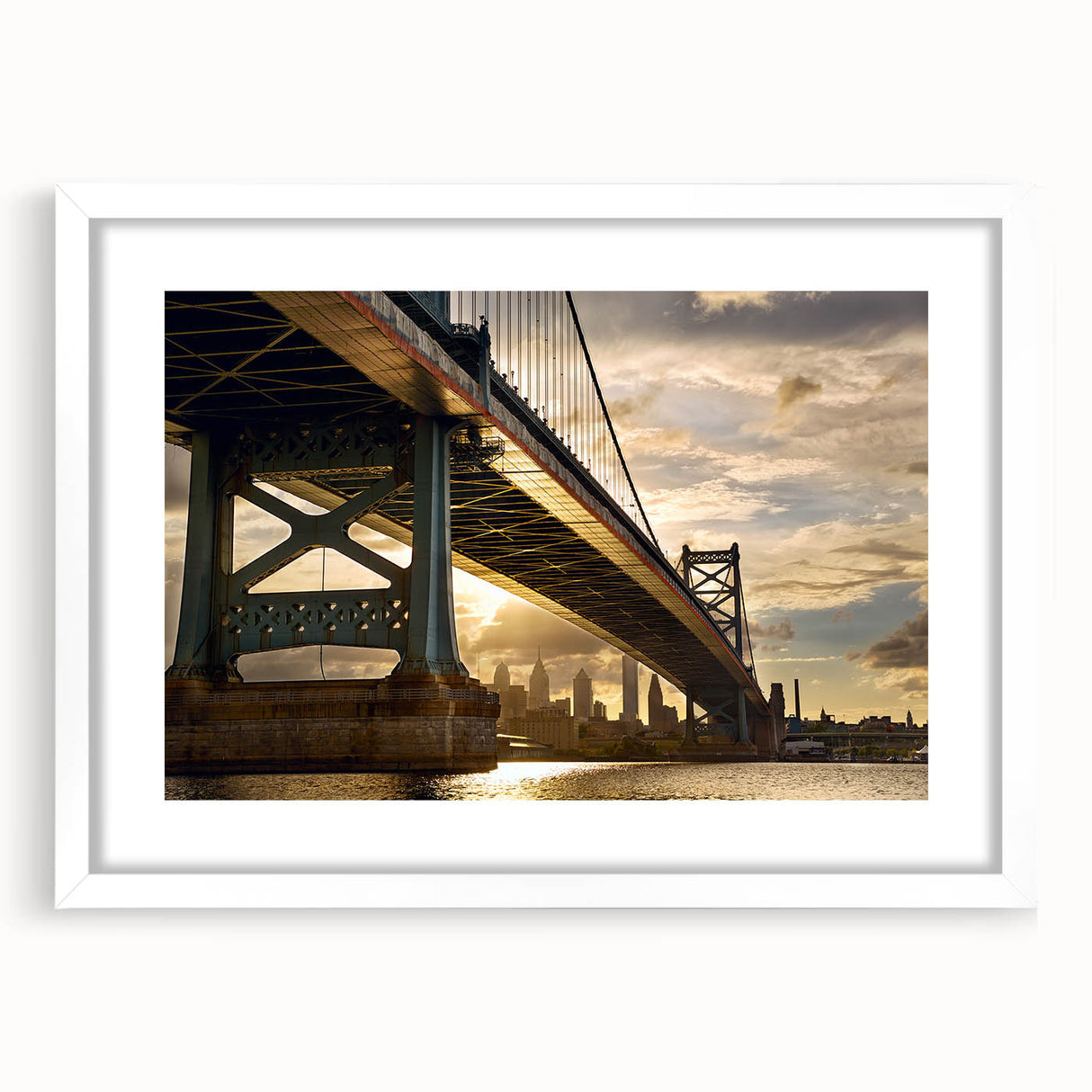 Abstract art print of Philadelphia skyline in muted blue and gray tones on a framed white mat, ideal for dining room decor.