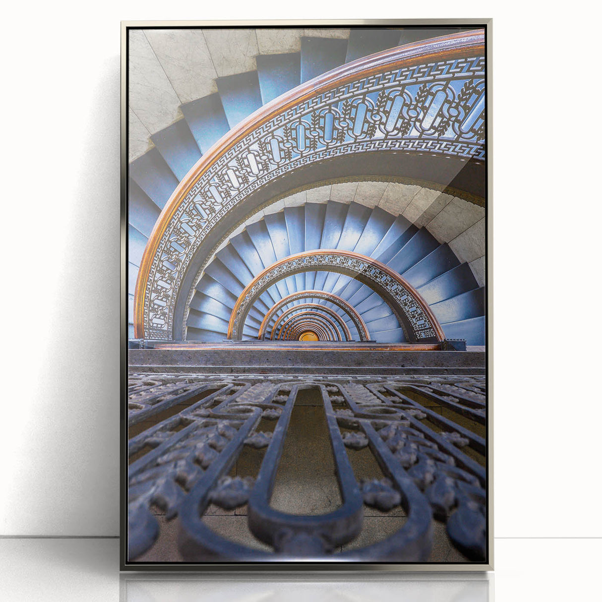 Mid-century modernist art of Pittsburgh skyline in muted gray and blue tones on a silver-framed acrylic print.