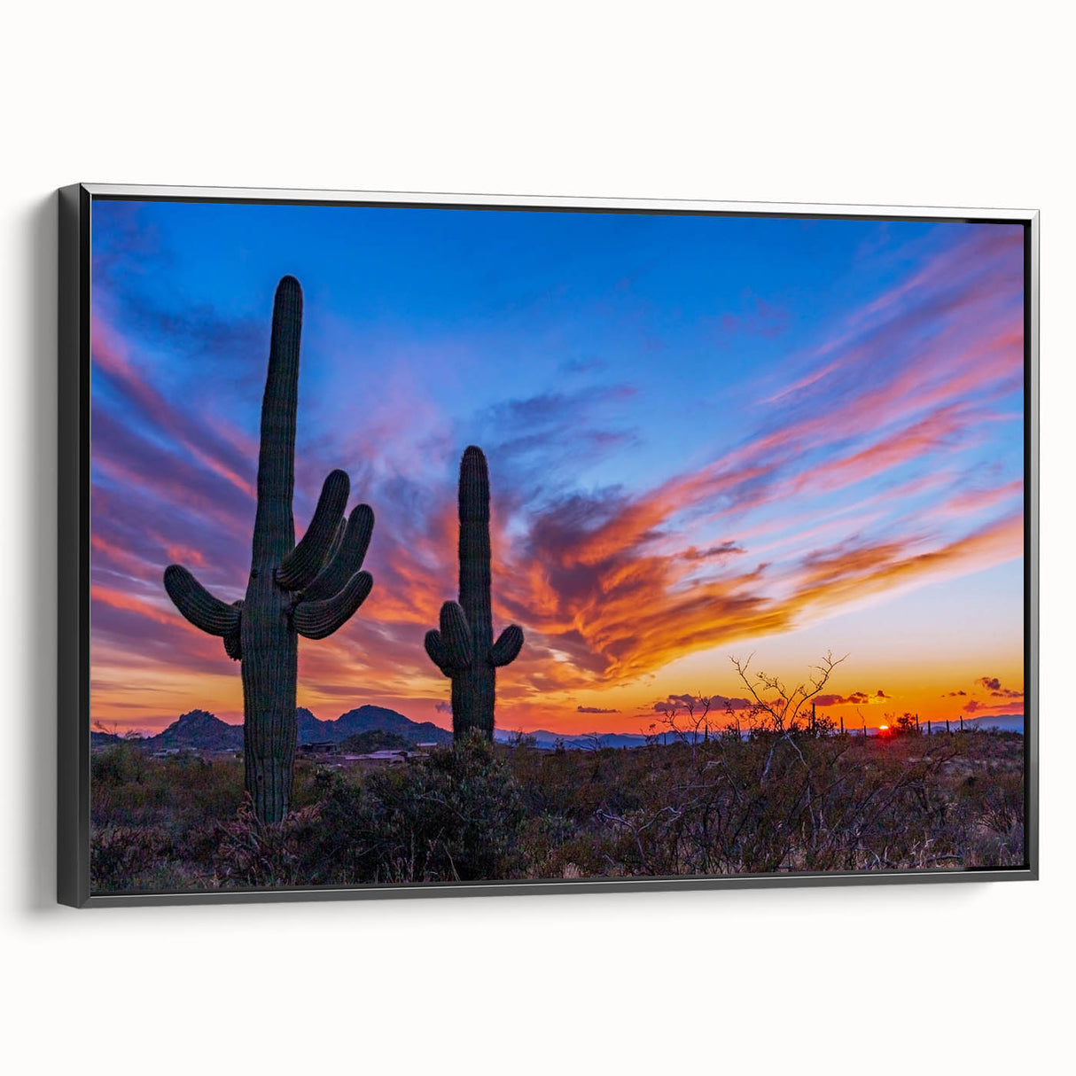 Black and white framed canvas of Phoenix valley landscape, ideal for bedroom wall decor.