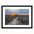 Abstract art print of South Dakota Badlands in vibrant, textured colors on a large black-framed canvas.