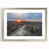 Textured art print of South Dakota Badlands in muted earth tones on a framed canvas, suitable for bedroom decor.