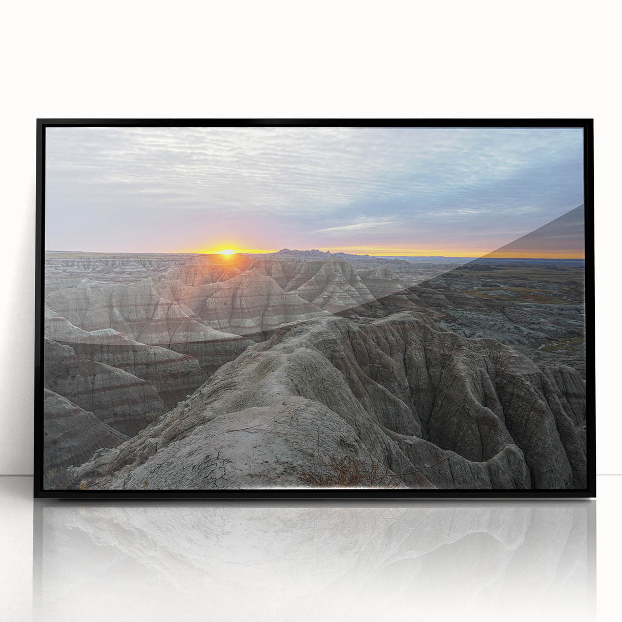 Large abstract wall art depicting the South Dakota Badlands in muted earth tones on a framed acrylic.