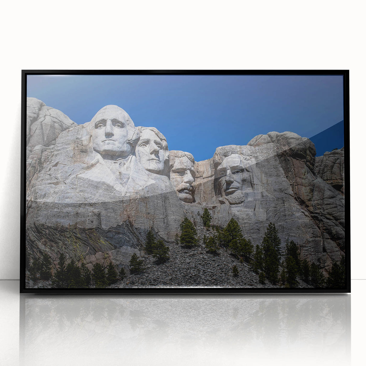 Acrylic print of Mt. Rushmore with muted earth tones in a black frame, suitable for modern art wall decor.