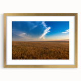 Extra large abstract art print of South Dakota scenery in muted earth tones, framed in gold, ideal for living room decor.