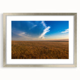 Textured abstract art print depicting South Dakota scenery in muted earth tones, framed with a silver mat.