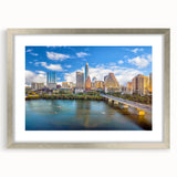 Textured abstract art print of Austin skyline in muted earth tones on a framed canvas, suitable for bedroom decor.