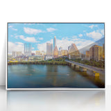Art deco poster of Austin, Texas skyline in muted blue and gray tones on framed acrylic.