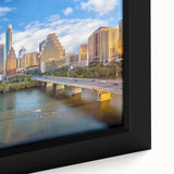 Close-up of textured black wall art featuring a colorful Austin, Texas skyline on a framed canvas.