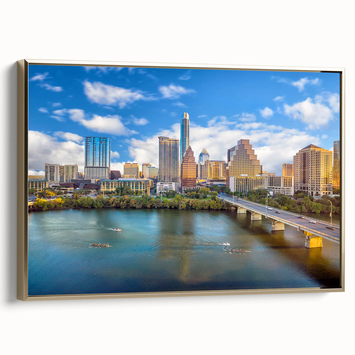 Framed canvas featuring a vintage poster art style landscape of Austin, Texas in black and gold tones.