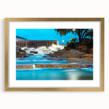 Abstract art print of San Antonio skyline in muted earth tones on a textured, gold-framed canvas.