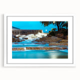 Abstract art print of San Antonio skyline in muted gray and blue tones on a framed white mat, ideal for dining room decor.