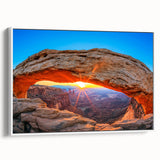 Vintage poster art of Arches National Park on framed canvas, featuring earthy tones, ideal for living room decor.