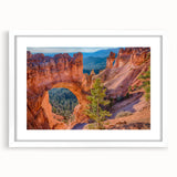 Abstract art print of Bryce Canyon in pastel shades on a white framed canvas, suitable for dining room decor.