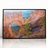Large abstract wall art depicting Bryce Canyon in muted orange and red tones, framed in black acrylic.