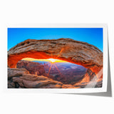 Rolled print of Canyonlands, USA, featuring earthy red and orange tones.