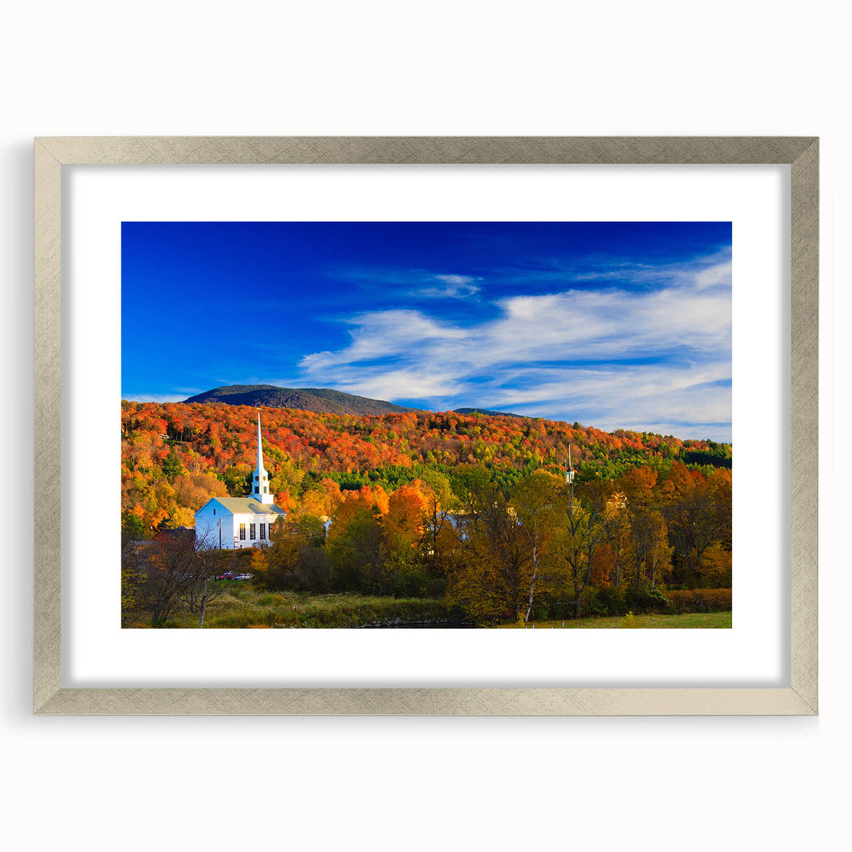 Textured art print of an abstract Vermont landscape in muted earth tones, framed in silver, ideal for bedroom decor.