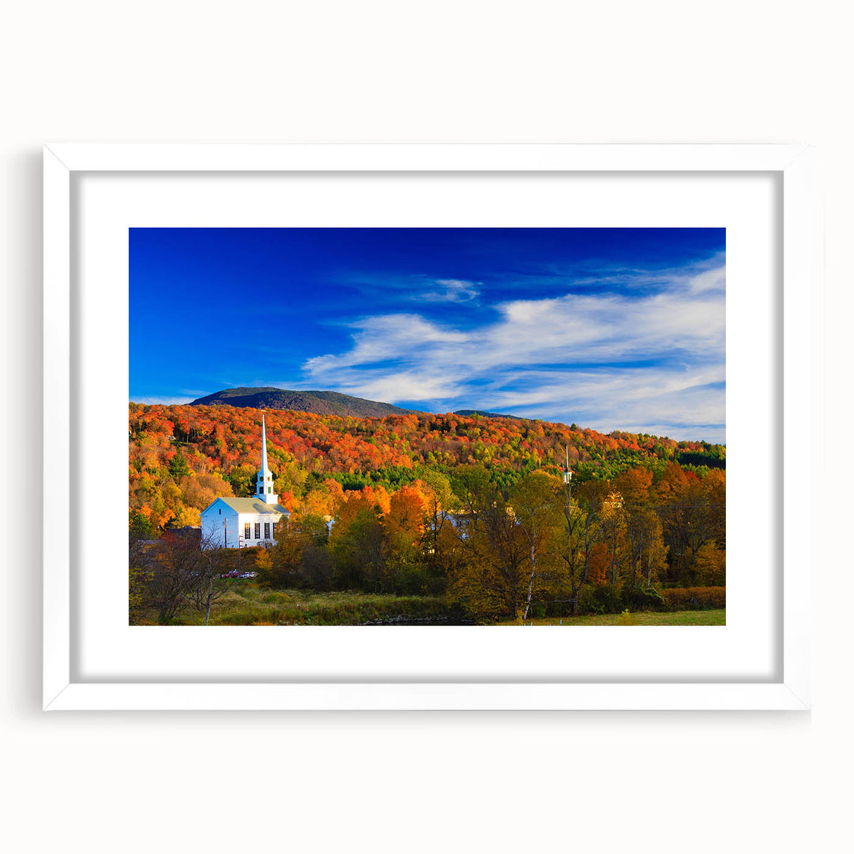 Abstract art print of Vermont landscape in muted green and brown tones on a framed white mat, suitable for dining room decor.