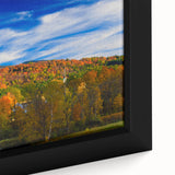 Framed canvas featuring a textured depiction of a Vermont landscape in vibrant colors.