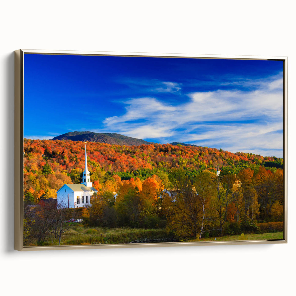 Framed canvas of a Vermont landscape in muted gold and black tones, ideal for bedroom wall decor.