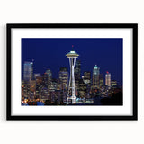 Extra large abstract art print of Seattle skyline in vibrant colors on textured canvas, framed in black.