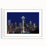Abstract art print of Seattle skyline in muted gray and blue tones on a framed white mat, ideal for dining room decor.