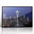 Large abstract wall art depicting the Seattle skyline in muted gray tones on a framed acrylic print.