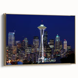Framed canvas of Seattle landscape with gold frame, featuring muted gray and blue tones, ideal for bedroom wall art.